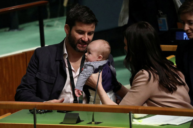 FILE PHOTO: New Zealand's then-Prime Minister Jacinda Ardern holds her baby Neve after speaking at the Nelson Mandela Peace Summit during the 73rd United Nations General Assembly in New York City, New York, U.S., September 24, 2018. Picture taken September 24, 2018. REUTERS/Carlo Allegri/File Photo